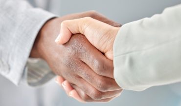 Business people, handshake and partnership in b2b, agreement or deal for collaboration, teamwork or.